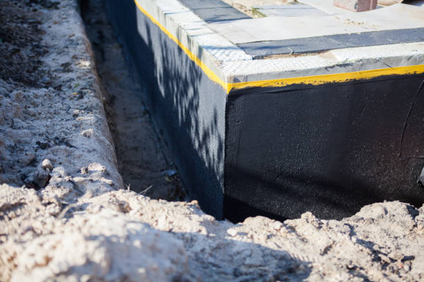 Professional Waterproofing technician working in Rogers, MN